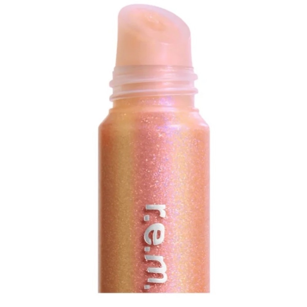 LIMITED EDITION rem beauty thank you next lip plumping gloss in shade 7 rings